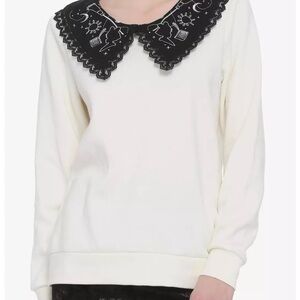 Her Universe Kiki’s Delivery Service White Sweater with Black Embroidered Collar
